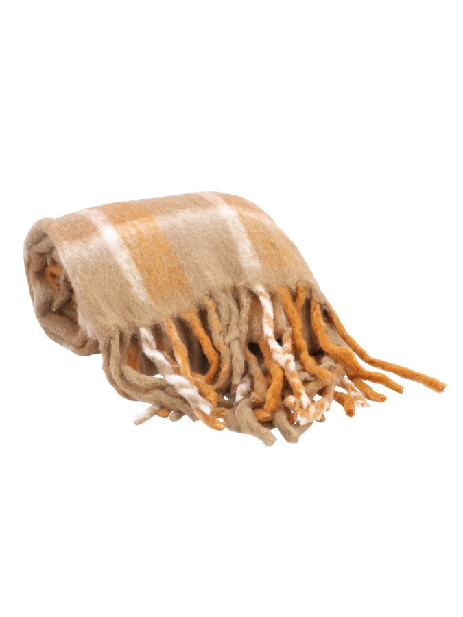 Terracotta Checked Tassel Throw – thoughtful gifts and beautiful finds from C&K, an independent lifestyle store in Settle.