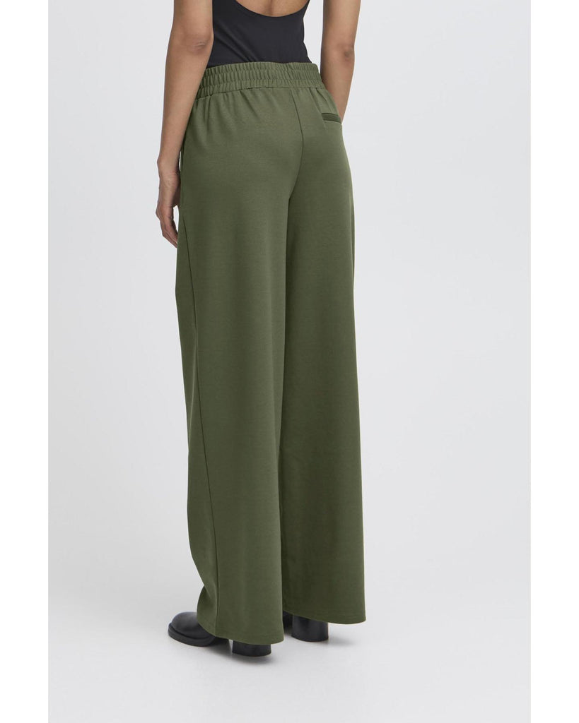 Kate long wide trousers rifle green – timeless women’s fashion from C&K, an independent lifestyle store in Settle, North Yorkshire.