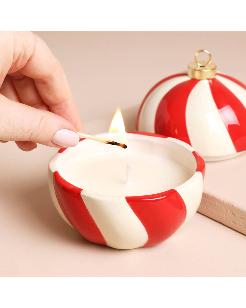 Candy Cane Stripe Cinnamon Bauble Candle Not available to EU – thoughtful gifts and beautiful finds from C&K, an independent lifestyle store in Settle.