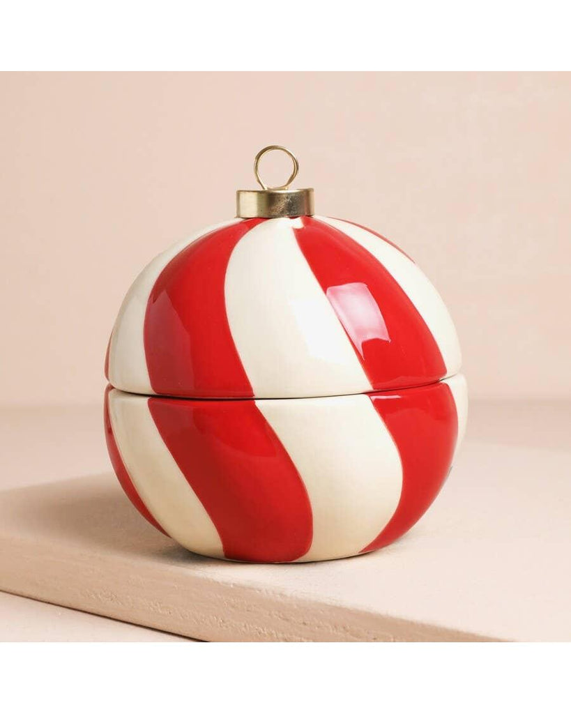 Candy Cane Stripe Cinnamon Bauble Candle Not available to EU – thoughtful gifts and beautiful finds from C&K, an independent lifestyle store in Settle.