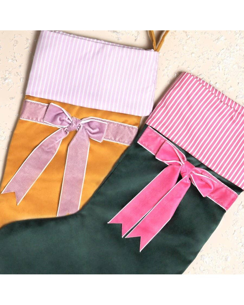 Velvet Bow Stockings: Green – thoughtful gifts and beautiful finds from C&K, an independent lifestyle store in Settle.