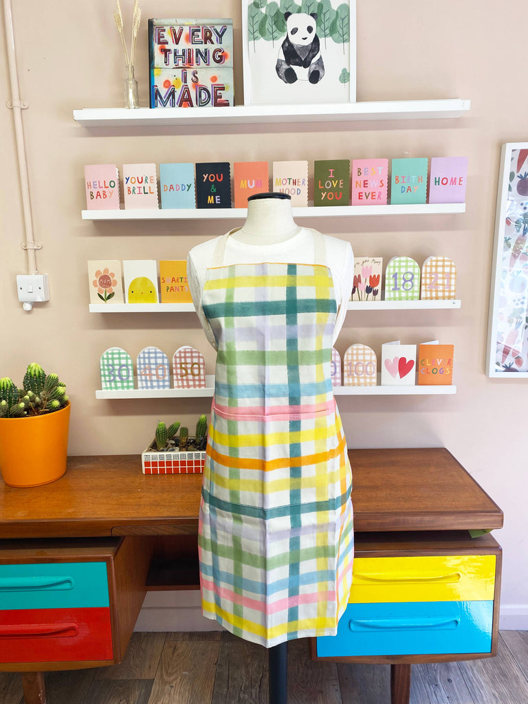 Bright Gingham Adult Apron – beautiful greeting card from C&K, an independent lifestyle store in Settle.
