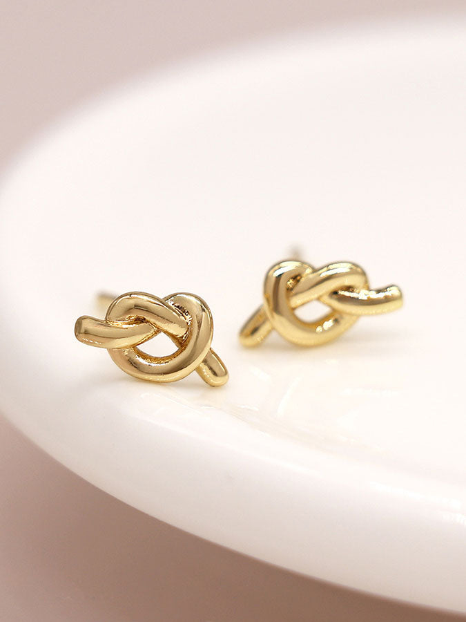 Faux Gold Plated Tiny Knot Stud Earrings – stylish accessories from C&K, an independent lifestyle store in Settle, North Yorkshire.