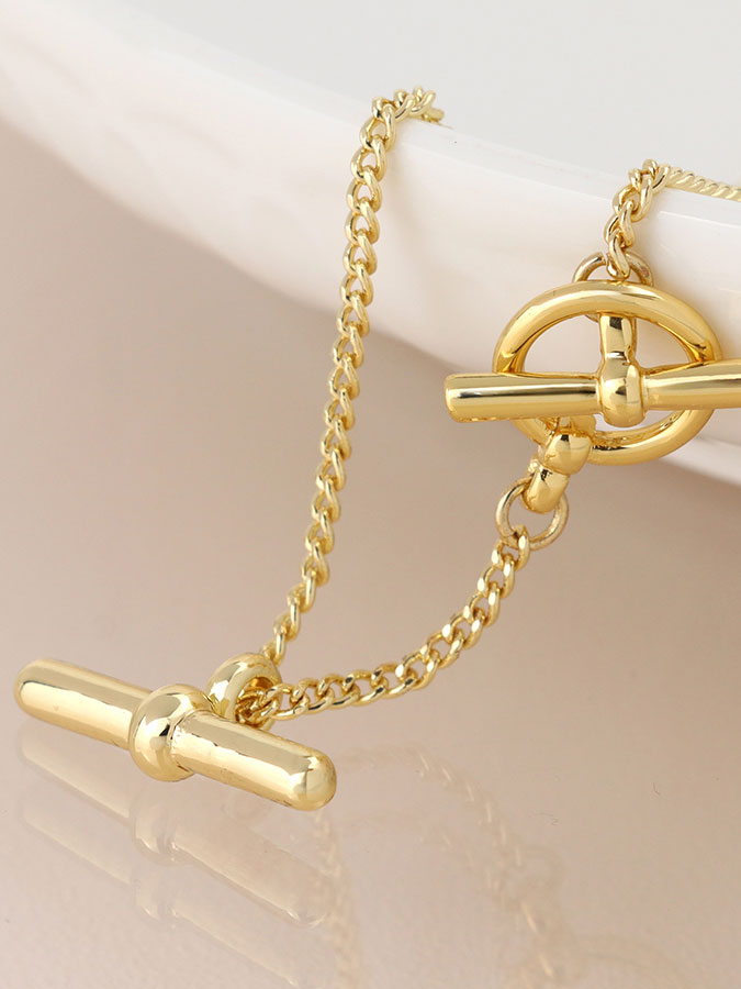 Faux Gold T Bar Pendant on Chain with T Bar Closure – stylish accessories from C&K, an independent lifestyle store in Settle, North Yorkshire.