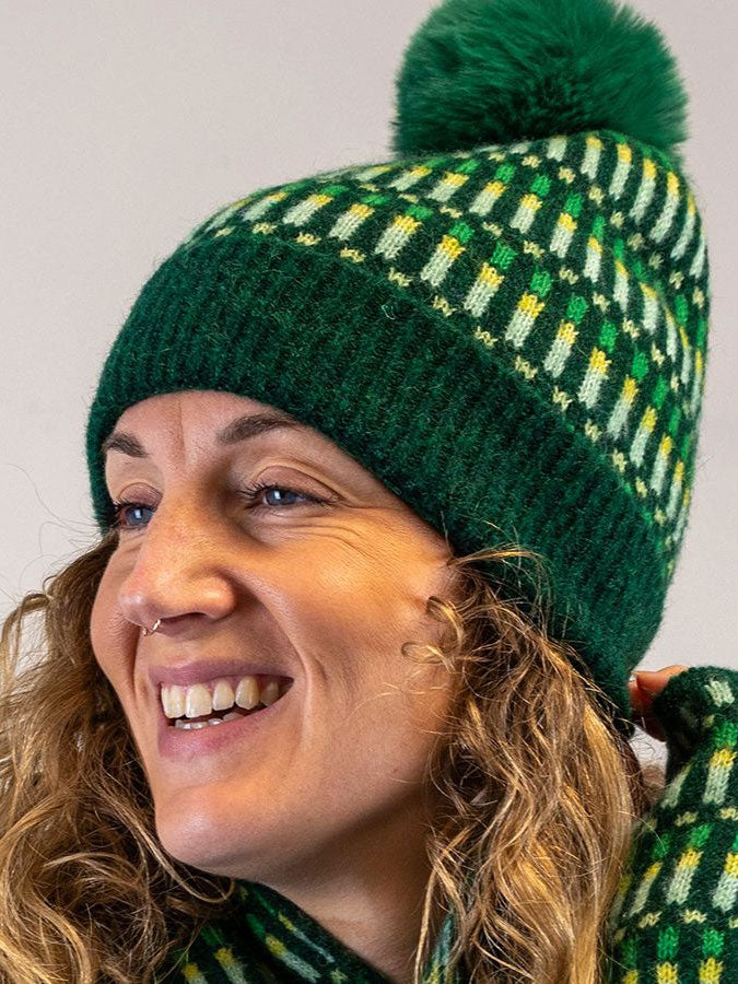 Green Mix Firework Pom Pom Hat – stylish accessories from C&K, an independent lifestyle store in Settle, North Yorkshire.