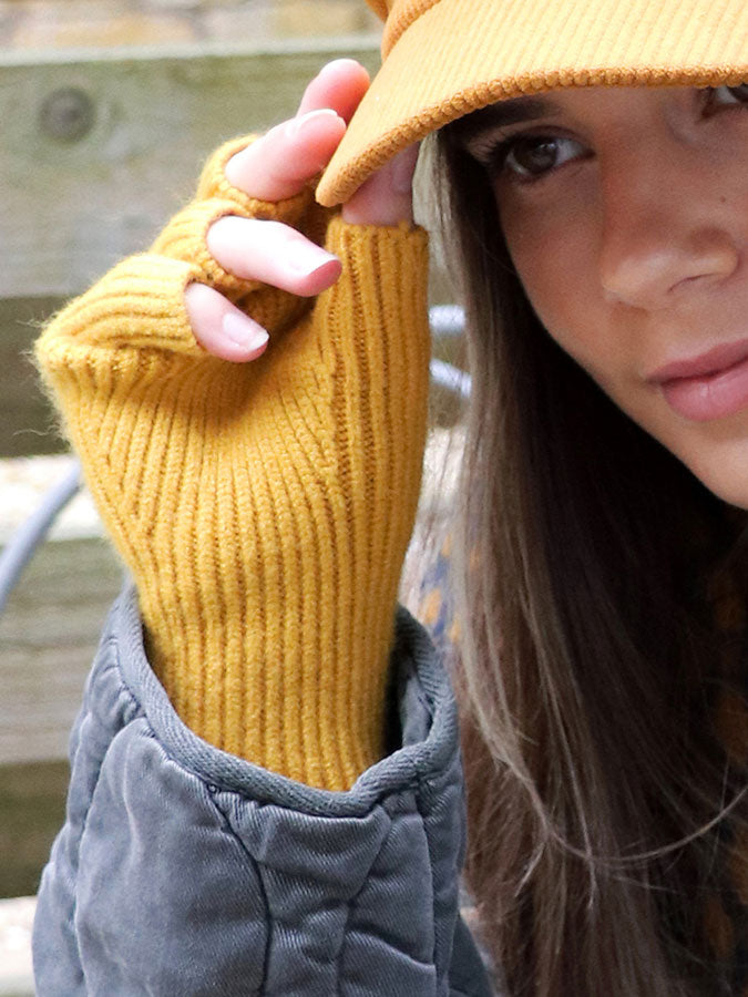 Mustard Ribbed Knitted Fingerless Gloves – stylish accessories from C&K, an independent lifestyle store in Settle, North Yorkshire.