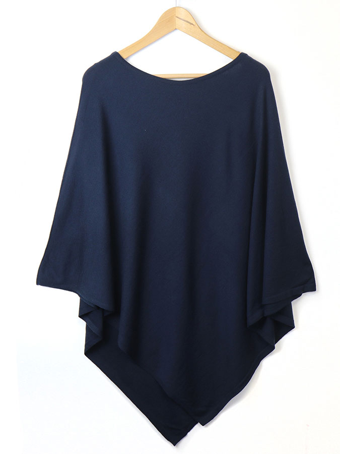 Navy Blue Fine Knit Poncho – stylish accessories from C&K, an independent lifestyle store in Settle, North Yorkshire.