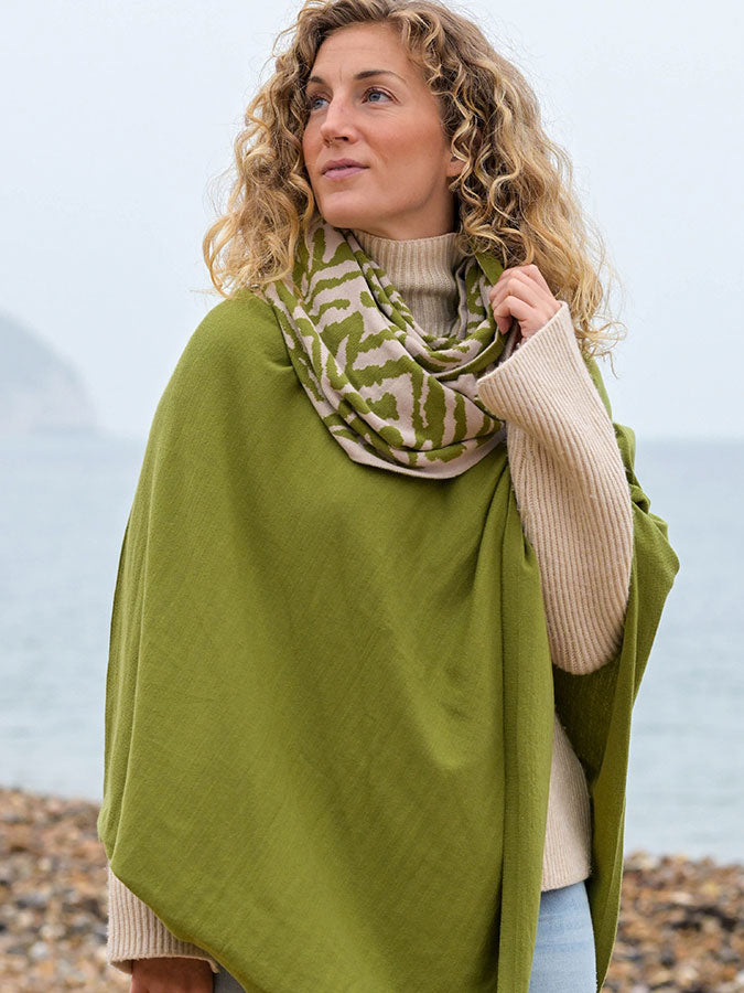 Pea Green Fine Knit Poncho – stylish accessories from C&K, an independent lifestyle store in Settle, North Yorkshire.