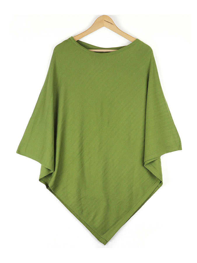 Pea Green Fine Knit Poncho – stylish accessories from C&K, an independent lifestyle store in Settle, North Yorkshire.