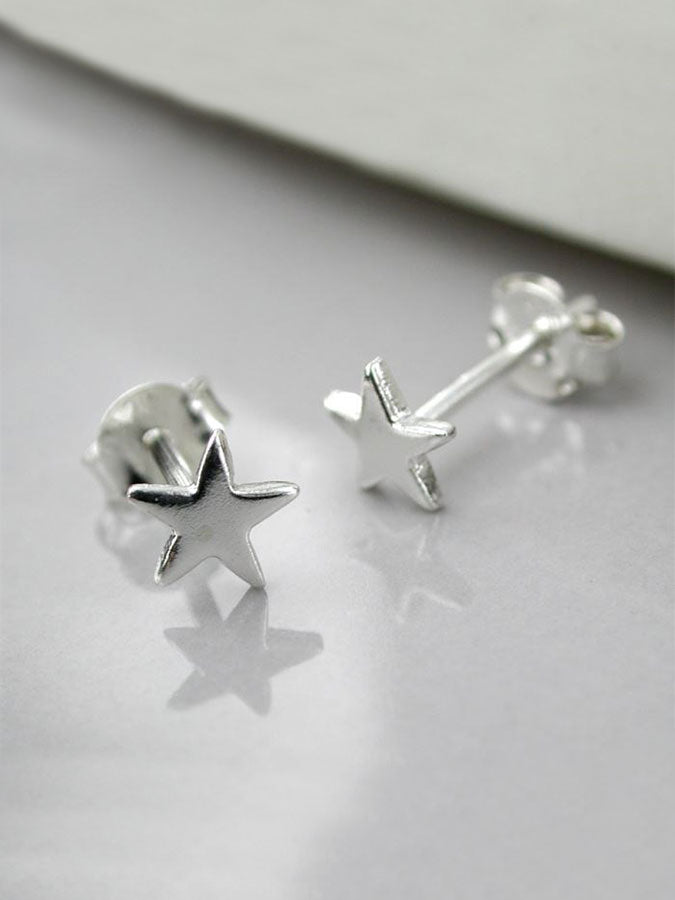 Shiny Silver Tiny Star Studs – stylish accessories from C&K, an independent lifestyle store in Settle, North Yorkshire.